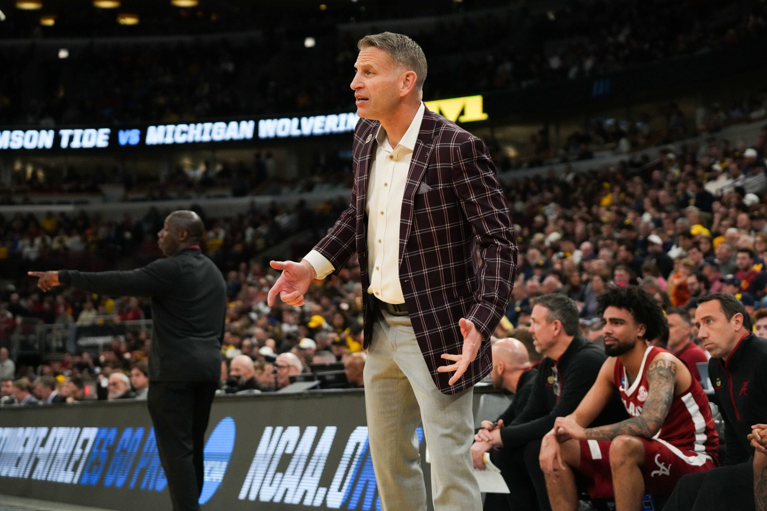 Mar 27, 2026; Chicago, IL, USA; Alabama Crimson Tide head coach Nate Oats looks on in the second half against the Michigan Wolverines during a Sweet Sixteen game of the Midwest Regional of the men's 2026 NCAA Tournament at United Center.