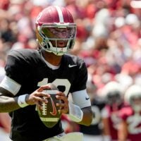 April 11, 2026; Tuscaloosa, AL, USA; Alabama quarterback Keelon Russell rolls out and throws a touchdown pass at Bryant-Denny Stadium during the Alabama A Day scrimmage.