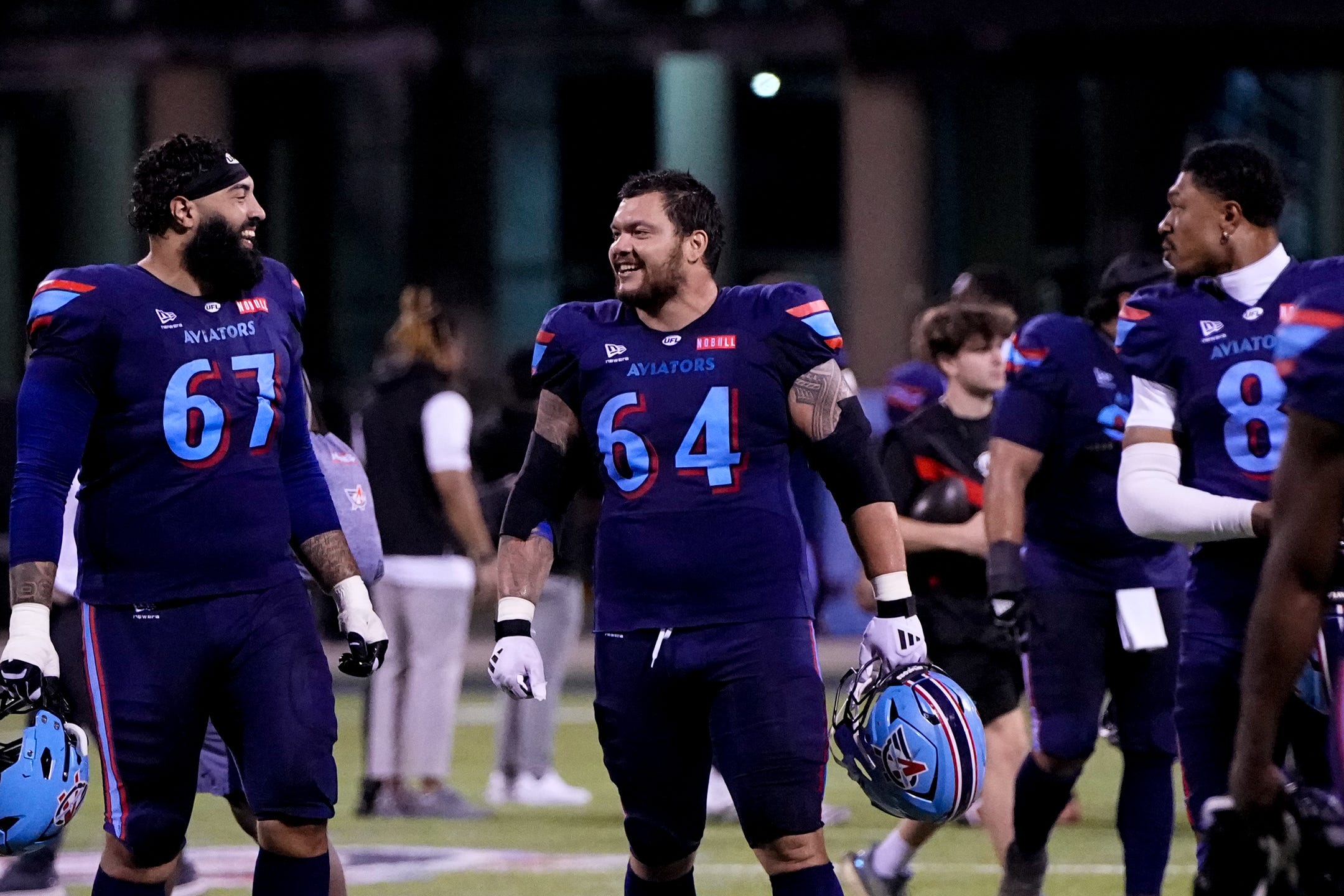 Columbus Aviators guard Aaron Monteiro (67), guard Chris Glaser (64) smile after the Aviators defeated the Dallas Renegades in their first victory in franchise history in the UFL at Historic Crew Stadium on Friday, April 17, 2026 in Columbus, Ohio.