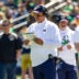 Apr 25, 2026; Notre Dame, IN, USA; Notre Dame offensive coordinator Mike Denbrock calls plays during the Blue-Gold game at Notre Dame Stadium.