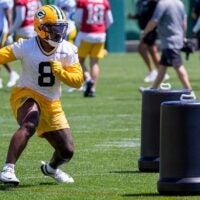 Green Bay Packers running back Josh Jacobs (8) runs through a drill during practice on Tuesday, June 2, 2026, at Ray Nitschke Field in Ashwaubenon, Wis.
