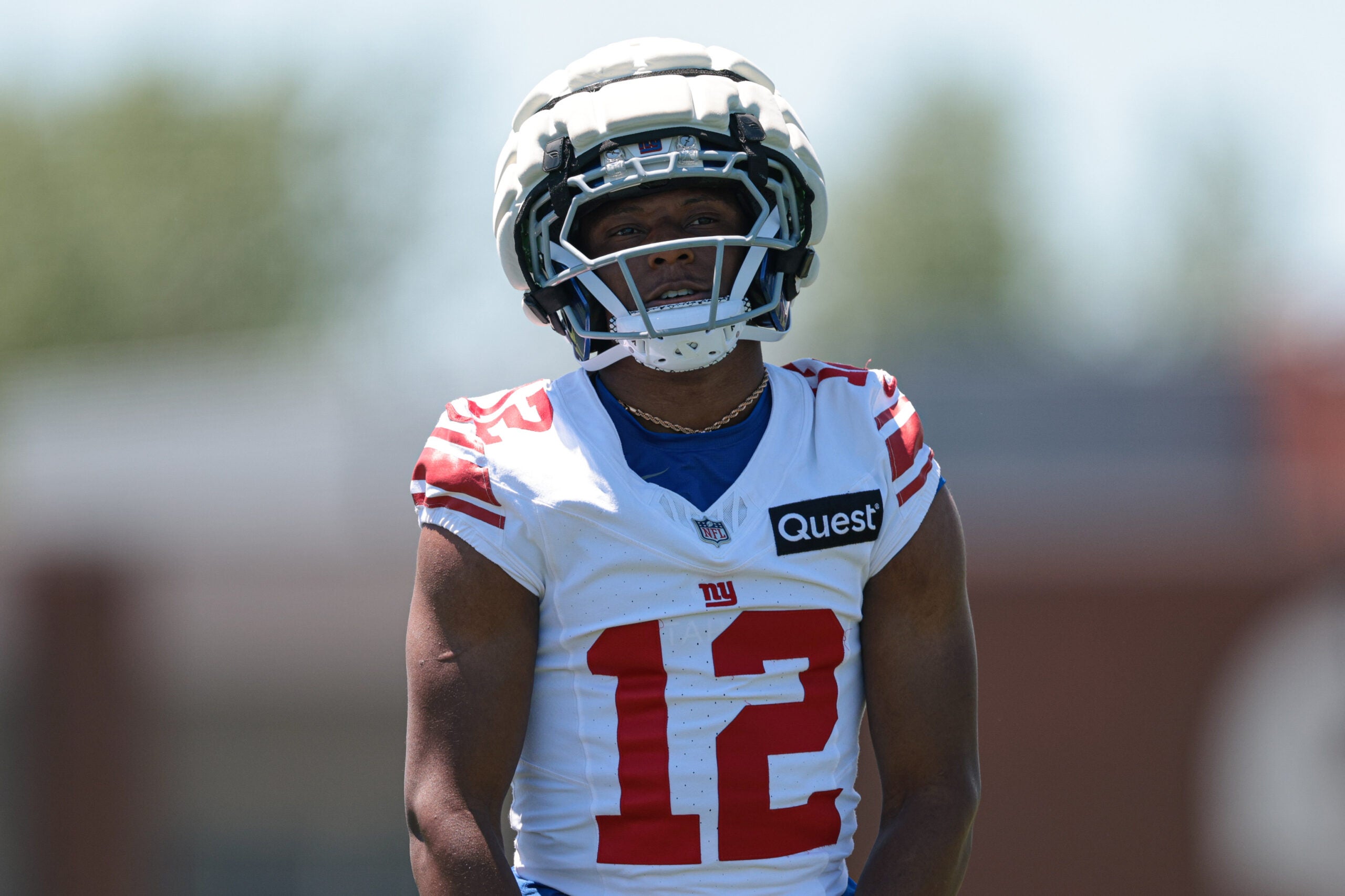 Jun 3, 2026; East Rutherford, NJ, USA; New York Giants cornerback Colton Hood (12) participates in drills during organized team activities at Quest Diagnostics Training Center.