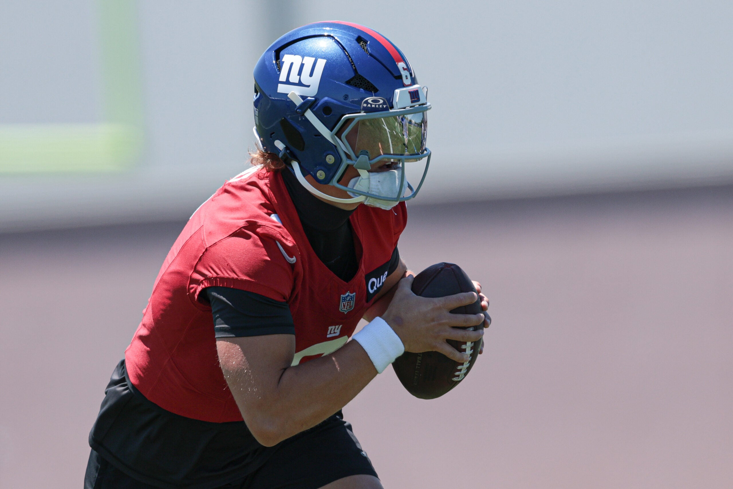 Jun 3, 2026; East Rutherford, NJ, USA; New York Giants quarterback Jaxson Dart (6) participates in drills during organized team activities at Quest Diagnostics Training Center.