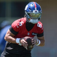 Jun 3, 2026; East Rutherford, NJ, USA; New York Giants quarterback Jaxson Dart (6) participates in drills during organized team activities at Quest Diagnostics Training Center.