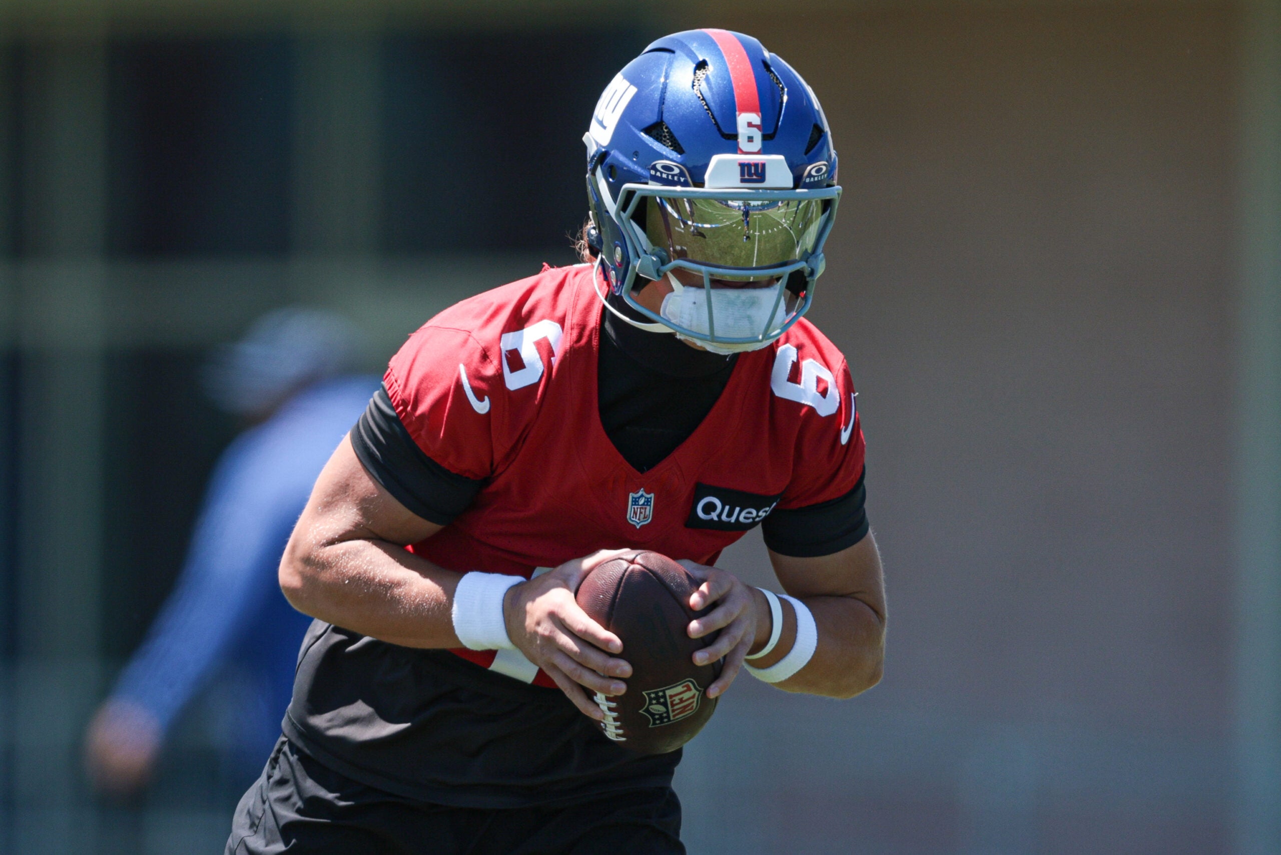 Jun 3, 2026; East Rutherford, NJ, USA; New York Giants quarterback Jaxson Dart (6) participates in drills during organized team activities at Quest Diagnostics Training Center.