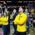 Michigan coach Dusty May watches the video board during the NCAA national championship trophy after the team beat Connecticut at Lucas Oil Stadium in Indianapolis on Monday, April 6, 2026.