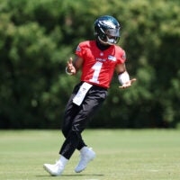 Jun 9, 2026; Philadelphia, PA, USA; Philadelphia Eagles quarterback Jalen Hurts (1) reacts to a drill during minicamp at Jefferson Health Training Complex.