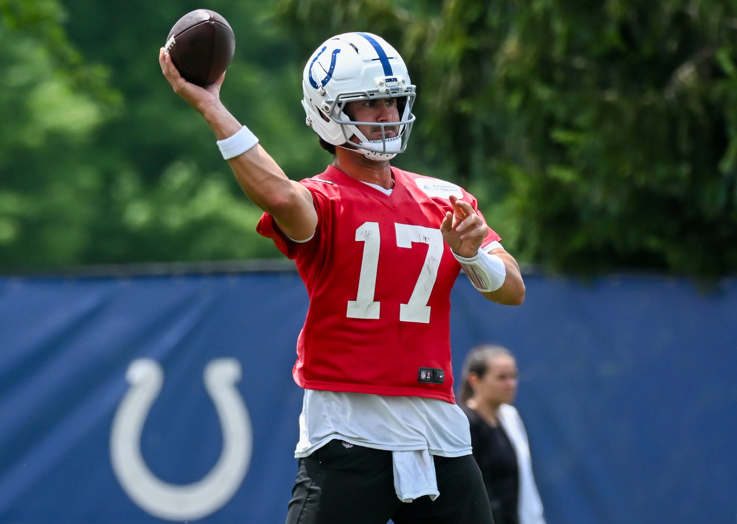 Jun 9, 2026; Indianapolis, IN, USA; Indianapolis Colts quarterback Daniel Jones (17) throws a pass during a drill during minicamp at Indiana Farm Bureau Football Center.