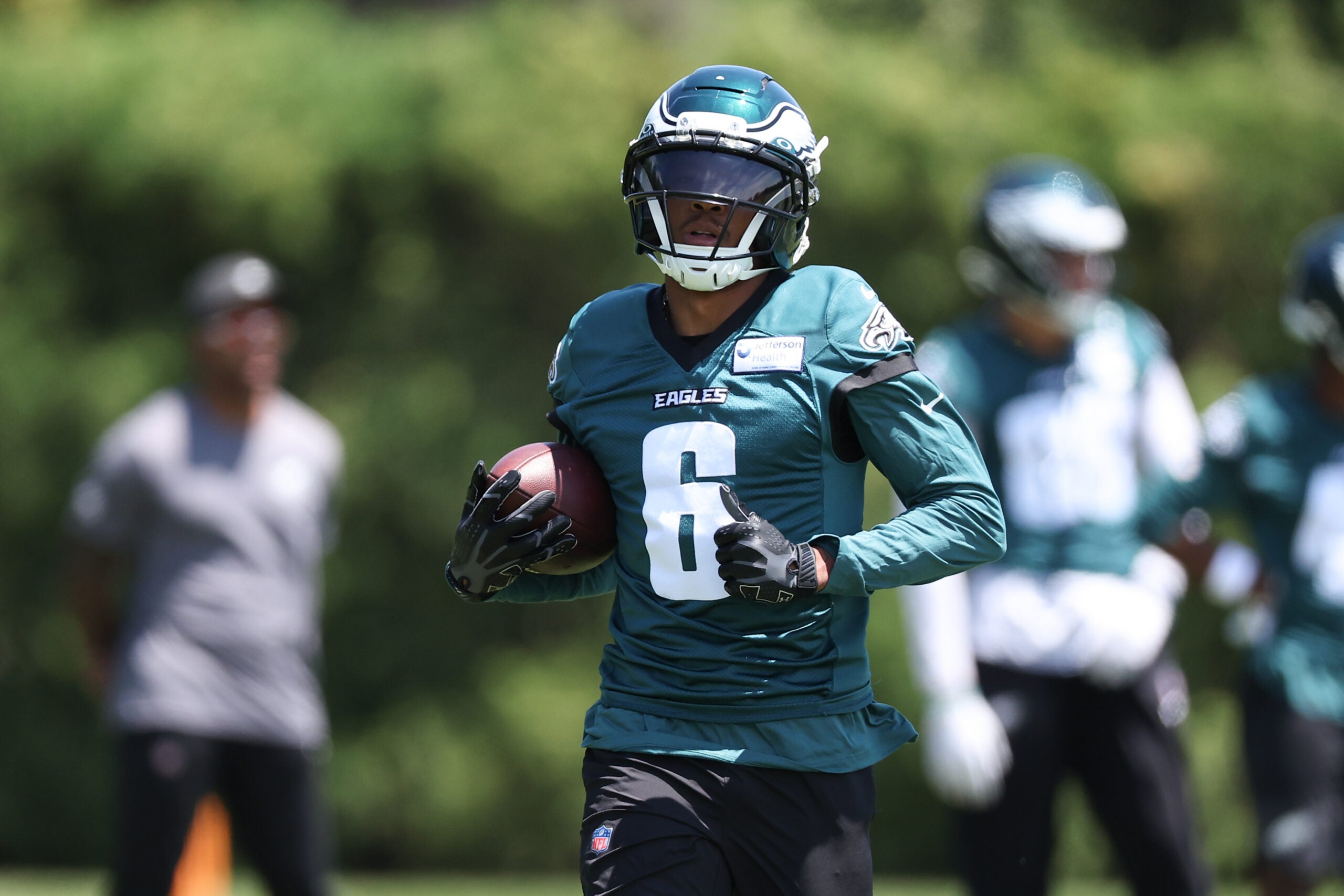 Jun 9, 2026; Philadelphia, PA, USA; Philadelphia Eagles wide receiver DeVonta Smith (6) runs drills during minicamp at Jefferson Health Training Complex.