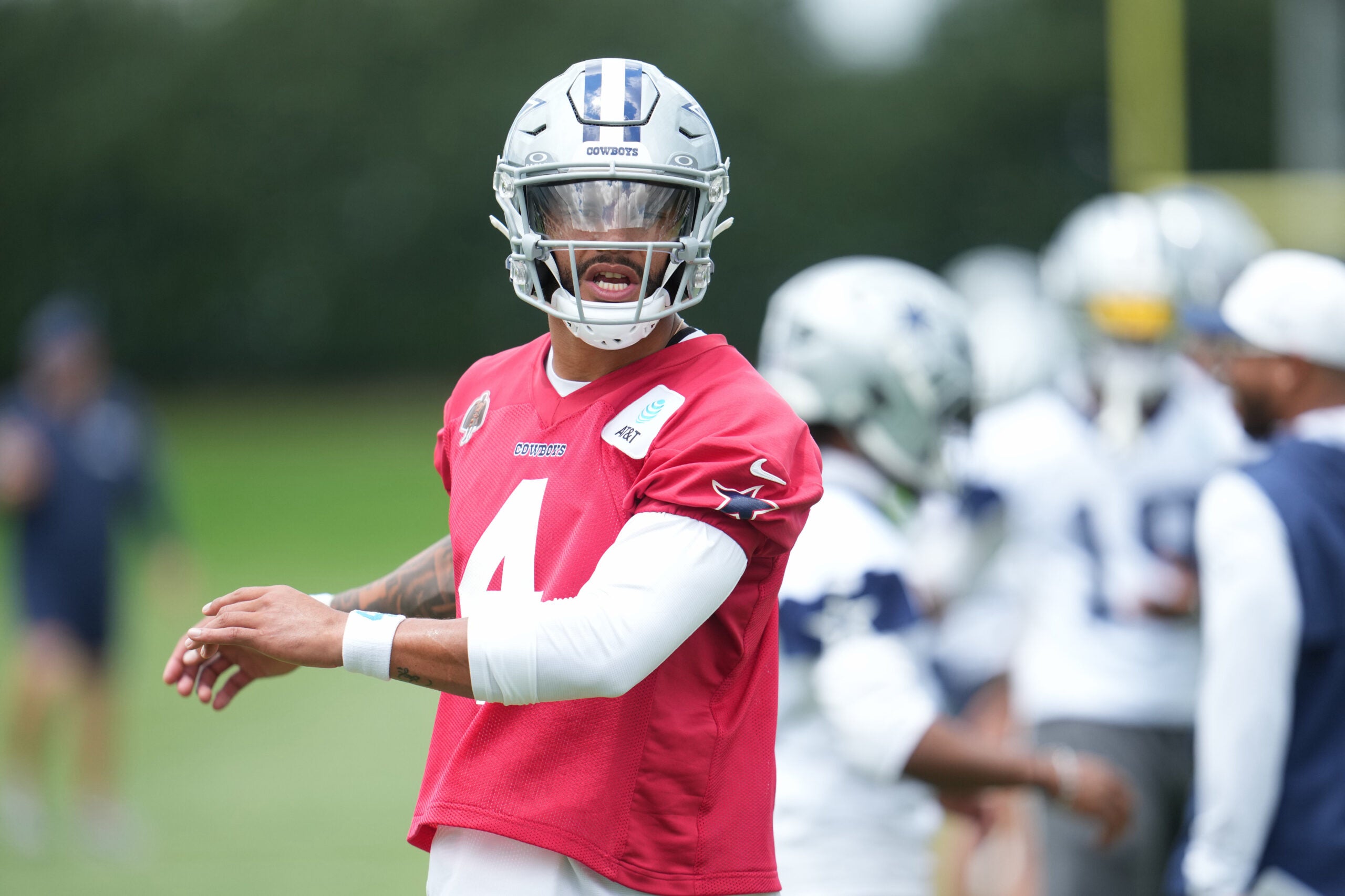 Jun 16, 2026; Dallas, TX, USA; Dallas Cowboys quarterback Dak Prescott (4) goes through a drill during practice at the Ford Center at the Star Training Facility in Frisco, Texas.