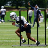 Jun 16, 2026; Dallas, TX, USA; Dallas Cowboys safety Caleb Downs (13) goes through a drill during practice at the Ford Center at the Star Training Facility in Frisco, Texas.