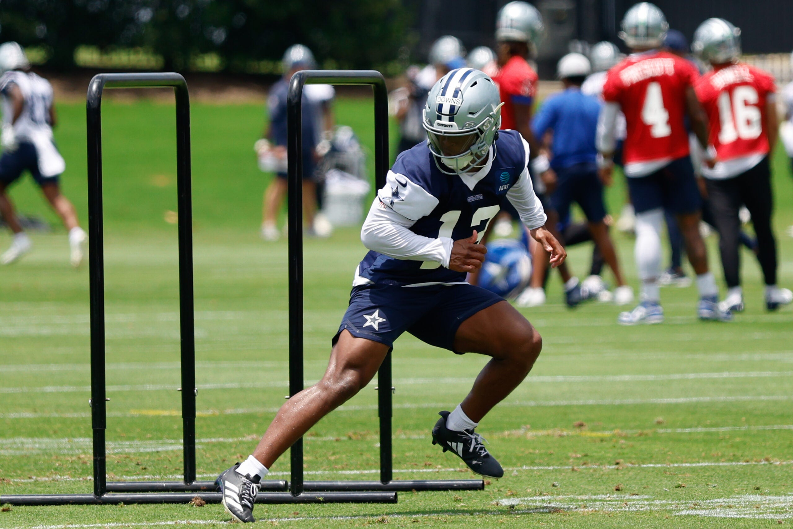 Jun 16, 2026; Dallas, TX, USA; Dallas Cowboys safety Caleb Downs (13) goes through a drill during practice at the Ford Center at the Star Training Facility in Frisco, Texas.