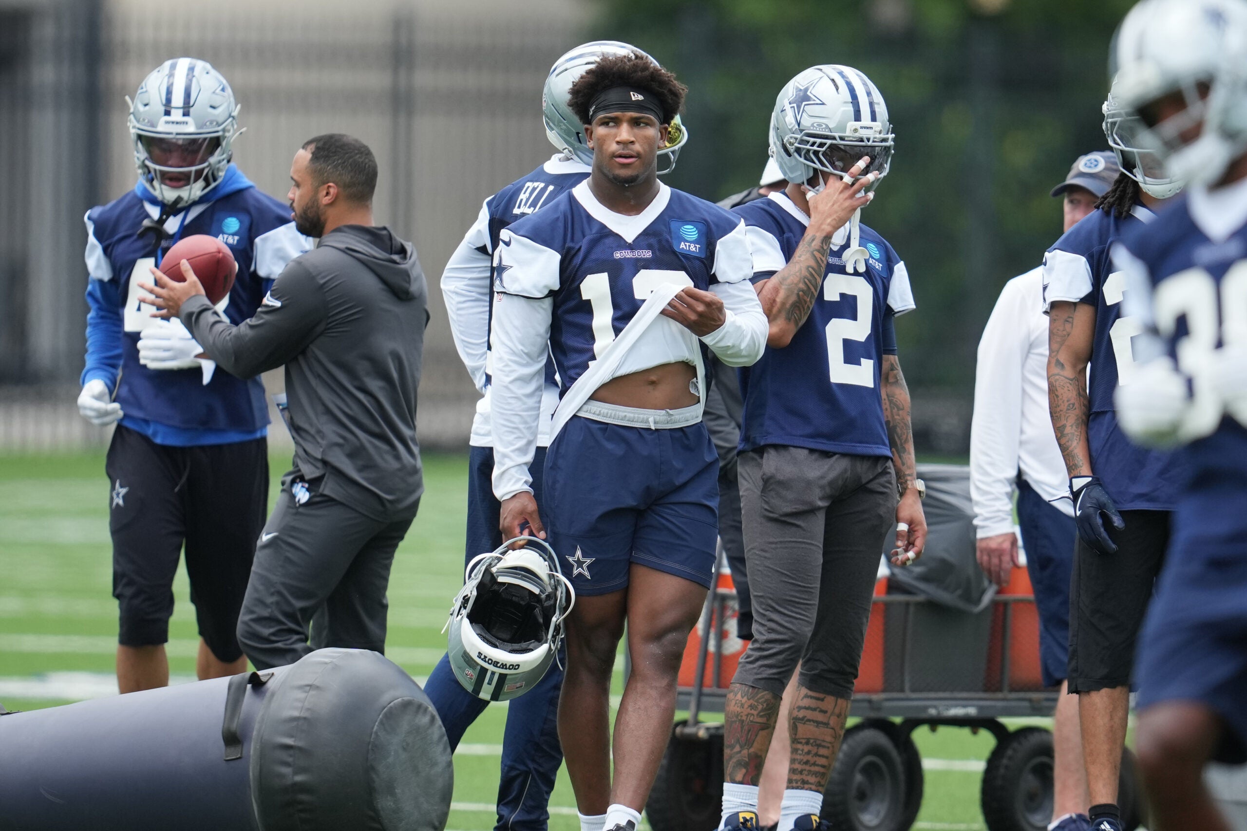 Jun 16, 2026; Dallas, TX, USA; Dallas Cowboys safety Caleb Downs (13) takes a break during practice at the Ford Center at the Star Training Facility in Frisco, Texas.