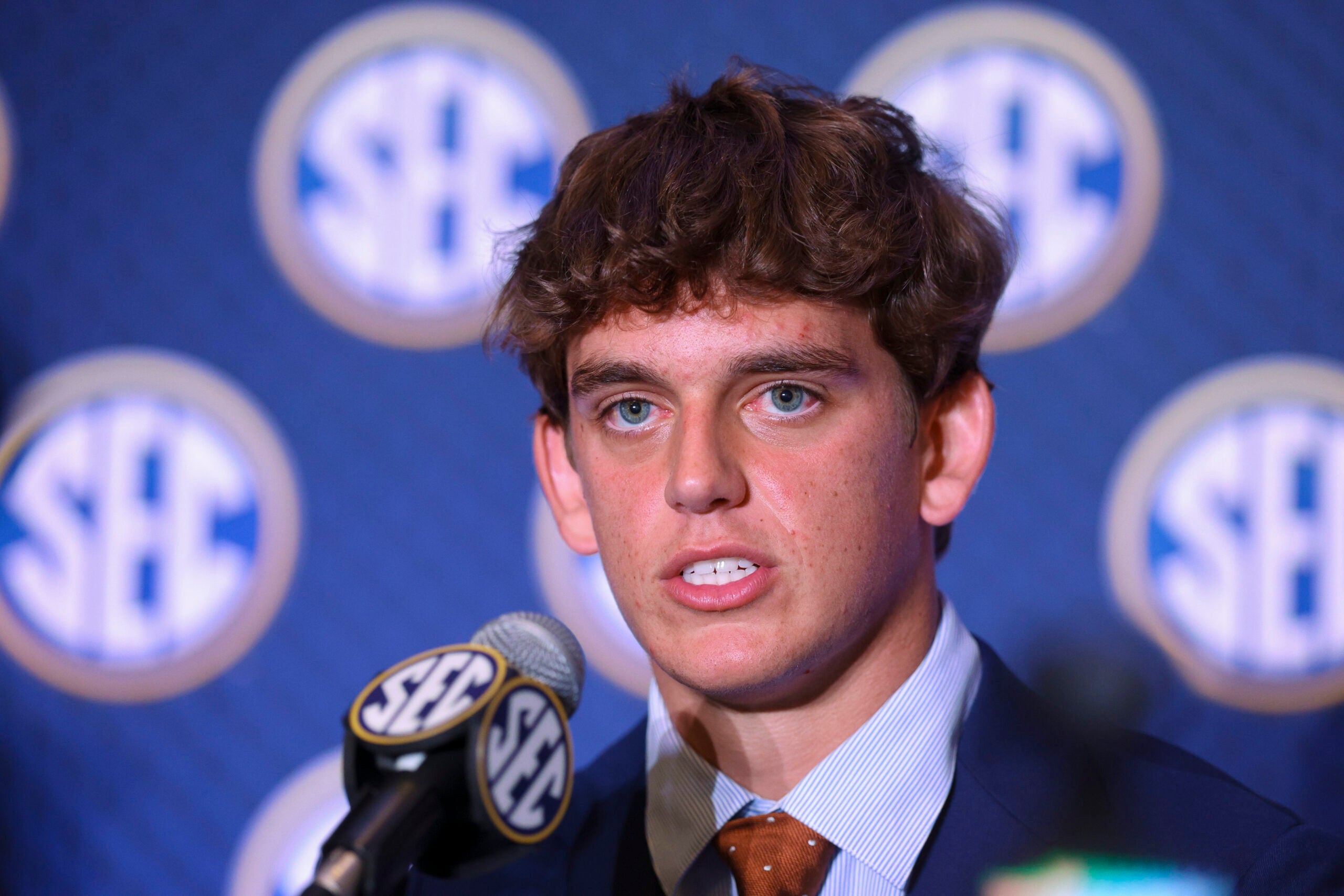 Jul 23, 2026; Tampa, FL, USA; Texas Longhorns quarterback Arch Manning (16) speaks to the press during SEC Football Kickoff Media Day at the Tampa Marriott.