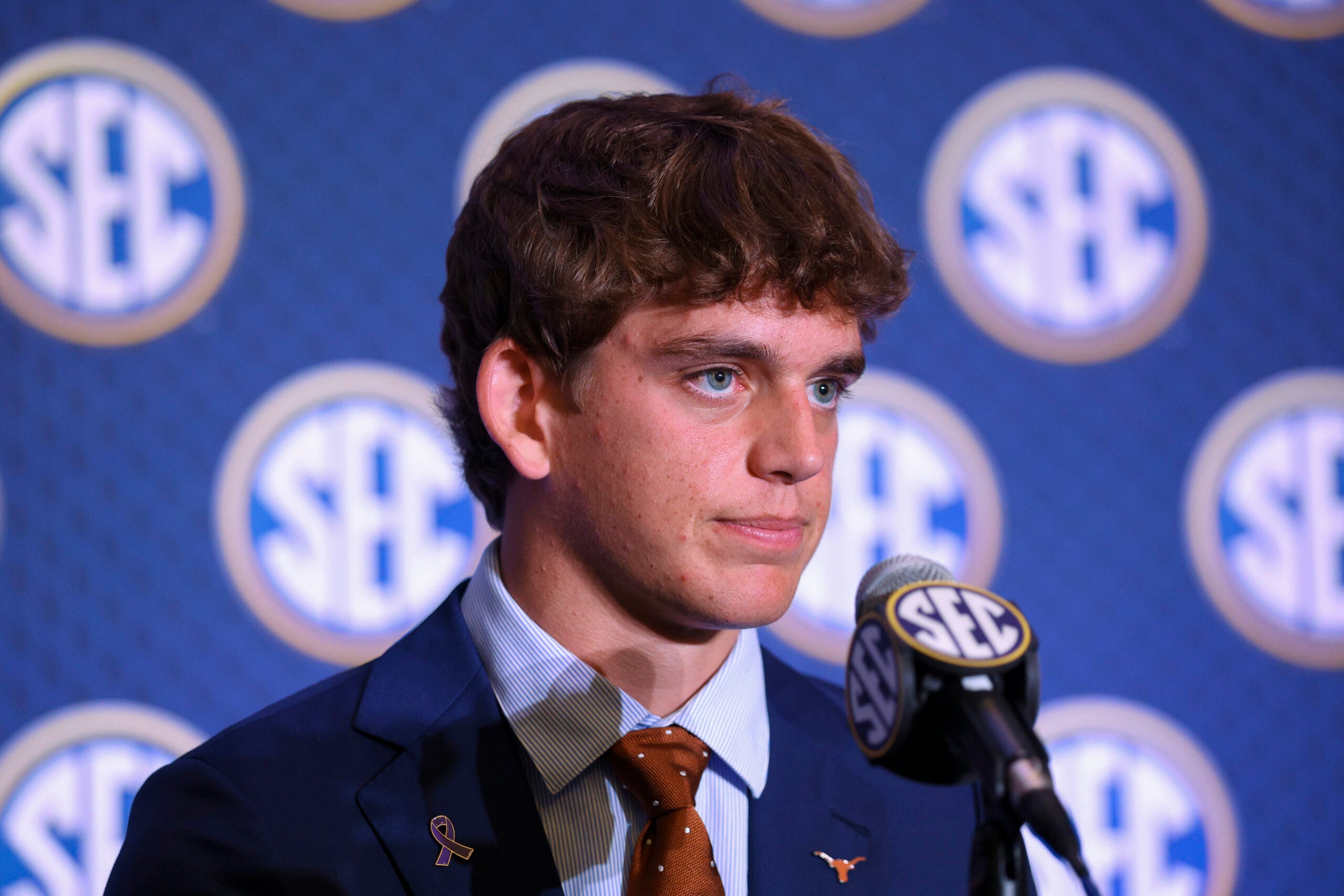 Jul 23, 2026; Tampa, FL, USA; Texas Longhorns quarterback Arch Manning (16) speaks to the press during SEC Football Kickoff Media Day at the Tampa Marriott.
