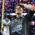 Feb 5, 2017; Houston, TX, USA; New England Patriots quarterback Tom Brady (12) celebrates with the Vince Lombardi Trophy after beating the Atlanta Falcons during Super Bowl LI at NRG Stadium.
