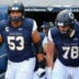 Nov 17, 2018; New York, NY, USA; Notre Dame Fighting Irish offensive lineman Sam Mustipher (53) and offensive lineman Tommy Kraemer (78) walk on the field prior to the game against the Syracuse Orange at Yankee Stadium.