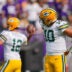 Sep 11, 2022; Minneapolis, Minnesota, USA; Green Bay Packers quarterback Jordan Love (10) watches quarterback Aaron Rodgers (12) warm up before the game against the Minnesota Vikings at U.S. Bank Stadium.