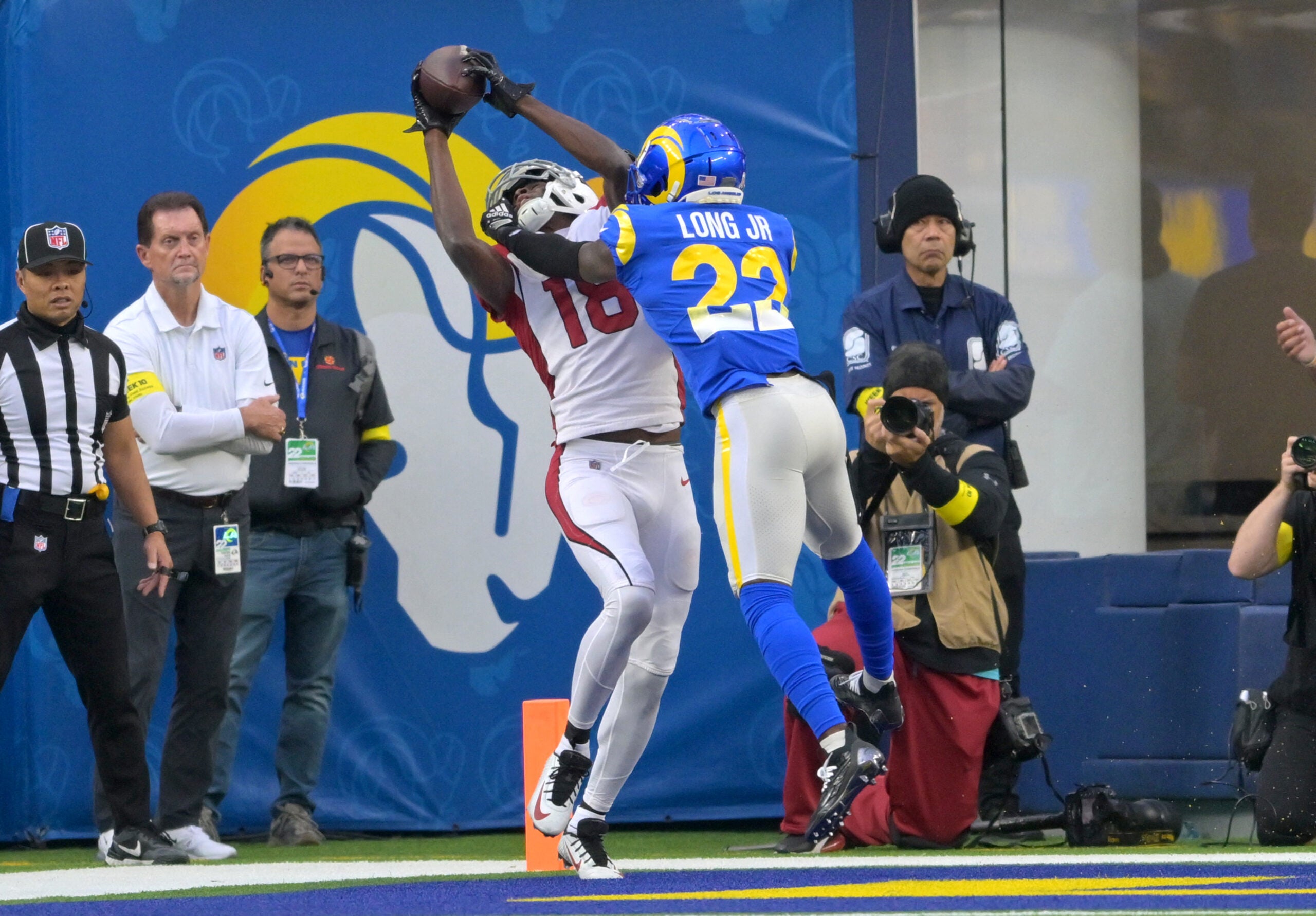 Nov 13, 2022; Inglewood, California, USA; Arizona Cardinals wide receiver A.J. Green (18) catches the ball in front of Los Angeles Rams cornerback David Long Jr. (22) for a touchdown in the first half at SoFi Stadium.