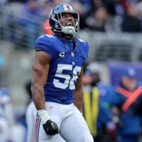 Dec 31, 2023; East Rutherford, New Jersey, USA; New York Giants linebacker Bobby Okereke (58) celebrates his sack against the Los Angeles Rams during the second quarter at MetLife Stadium.
