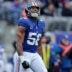 Dec 31, 2023; East Rutherford, New Jersey, USA; New York Giants linebacker Bobby Okereke (58) celebrates his sack against the Los Angeles Rams during the second quarter at MetLife Stadium.