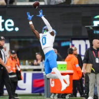 Aug 8, 2024; East Rutherford, New Jersey, USA; Detroit Lions cornerback Terrion Arnold (0) makes a catch during warmup prior to the game between the New York Giants and Detroit Lions at MetLife Stadium.