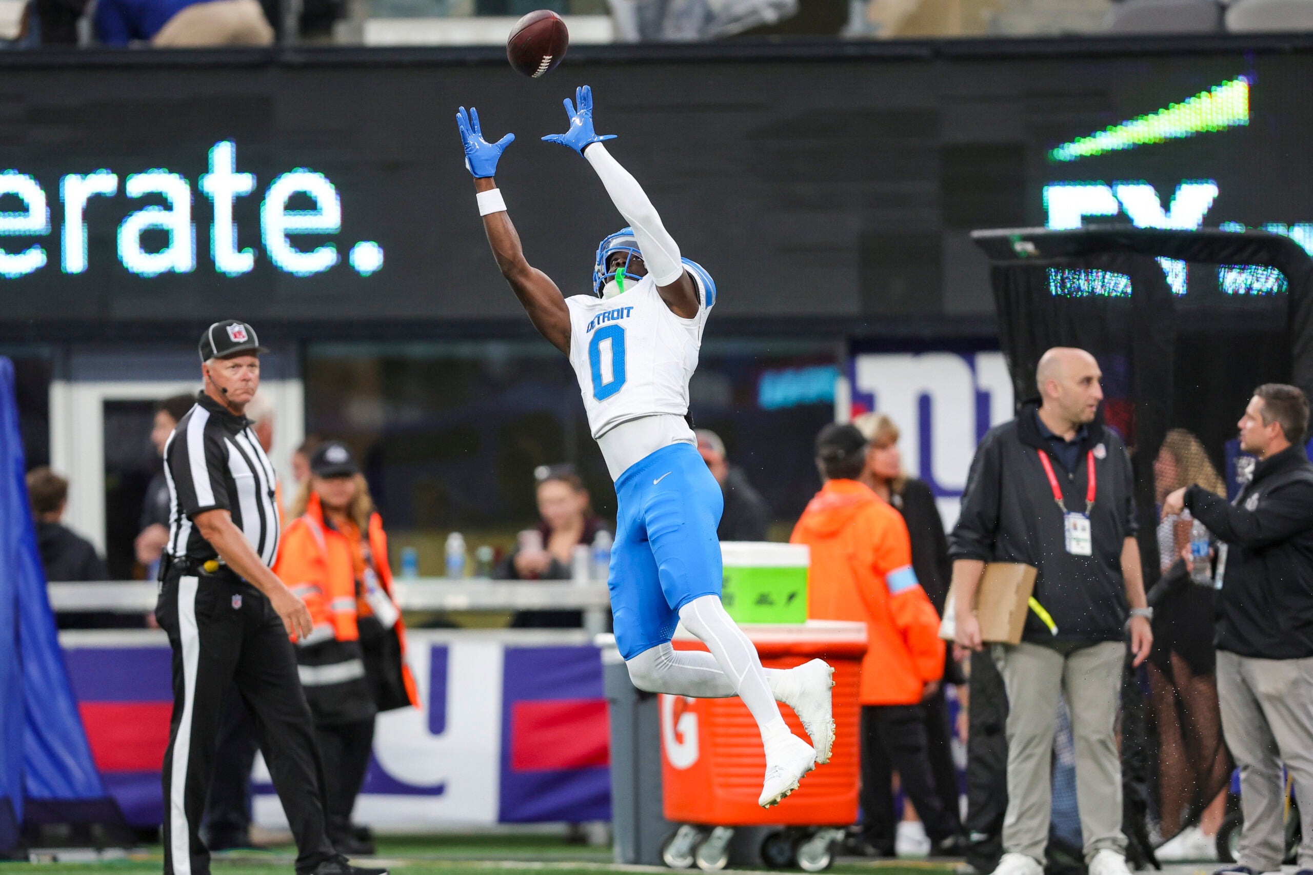 Aug 8, 2024; East Rutherford, New Jersey, USA; Detroit Lions cornerback Terrion Arnold (0) makes a catch during warmup prior to the game between the New York Giants and Detroit Lions at MetLife Stadium.