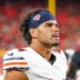 Aug 22, 2024; Kansas City, Missouri, USA; Chicago Bears defensive lineman Austin Booker (94) on the sidelines against the Kansas City Chiefs during the game at GEHA Field at Arrowhead Stadium.