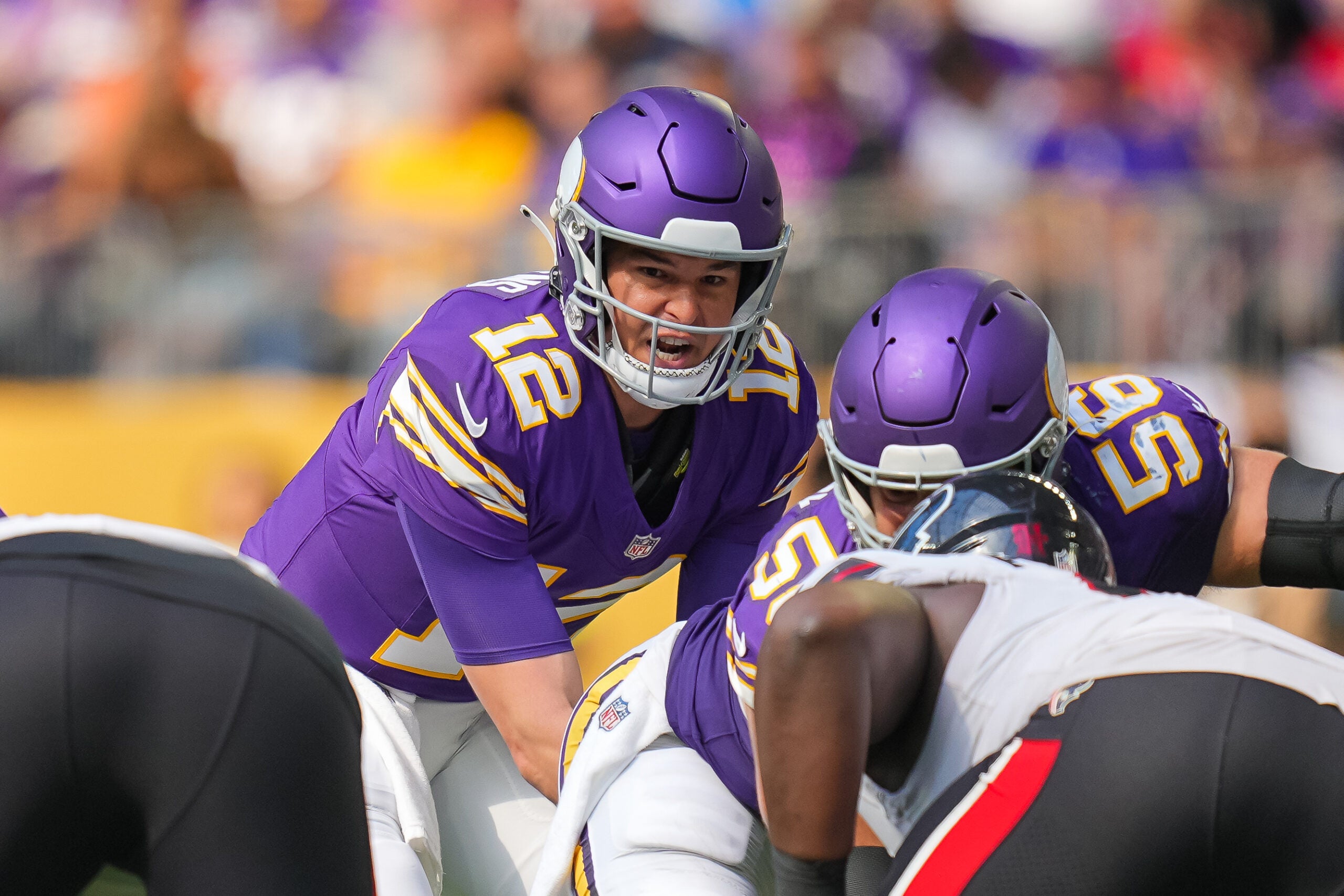 Sep 22, 2024; Minneapolis, Minnesota, USA; Minnesota Vikings quarterback Nick Mullens (12) under center against the Houston Texans in the third quarter at U.S. Bank Stadium.