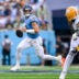 Sep 22, 2024; Nashville, Tennessee, USA; Tennessee Titans Will Levis (8) scrambles against the Green Bay Packers during the first half at Nissan Stadium.