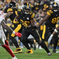 Oct 28, 2024; Pittsburgh, Pennsylvania, USA; Pittsburgh Steelers running back Najee Harris (22) runs against the New York Giants during the fourth quarter at Acrisure Stadium.