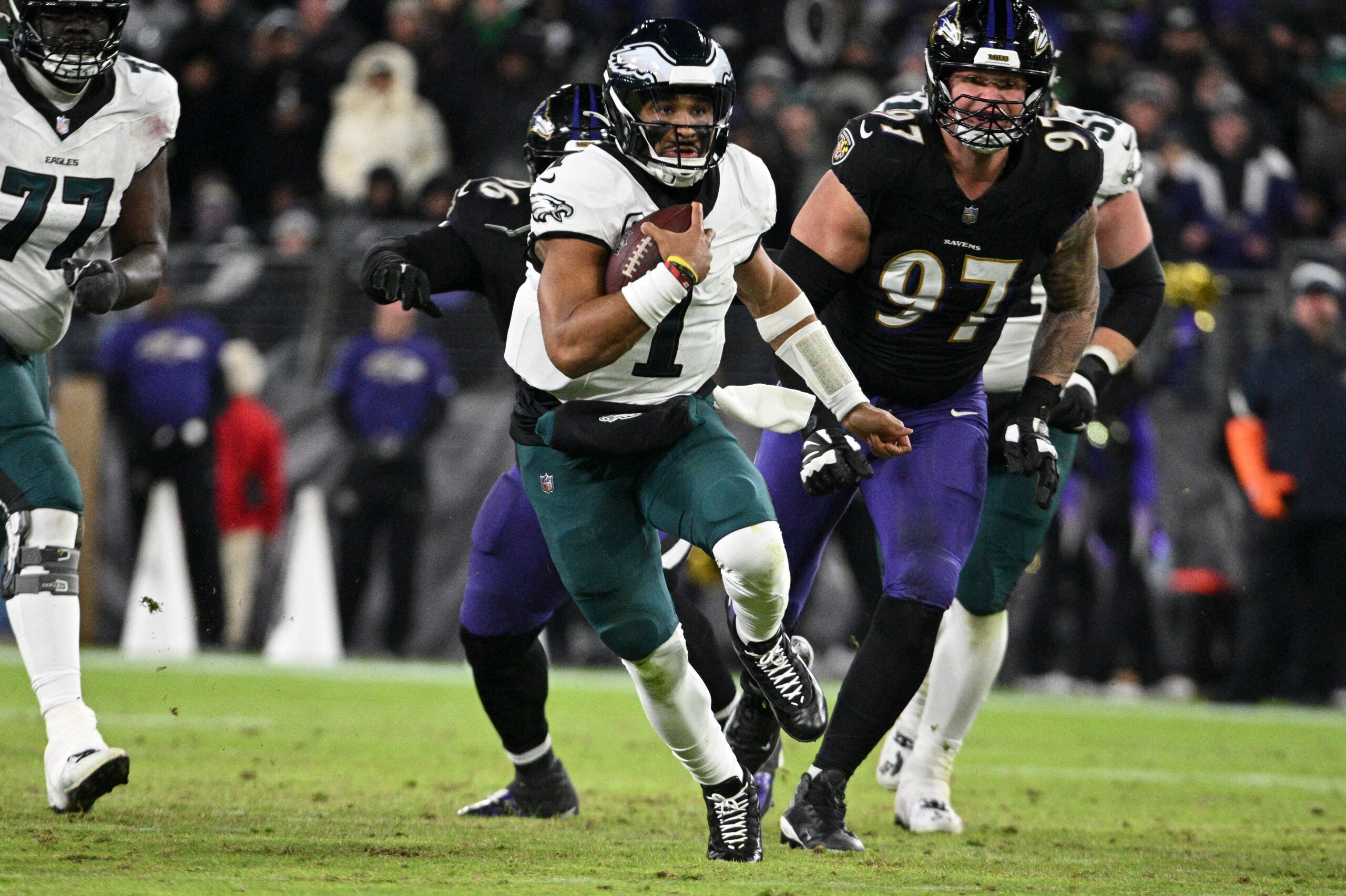 Dec 1, 2024; Baltimore, Maryland, USA; Philadelphia Eagles quarterback Jalen Hurts (1) rushes during the second half against the Baltimore Ravens at M&T Bank Stadium.