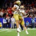 Jan 2, 2025; New Orleans, LA, USA; Notre Dame Fighting Irish defensive lineman Junior Tuihalamaka (44) reacts with Notre Dame Fighting Irish defensive lineman Donovan Hinish (41) after recovering a fumble during the second quarter after the game during the first half at Caesars Superdome.