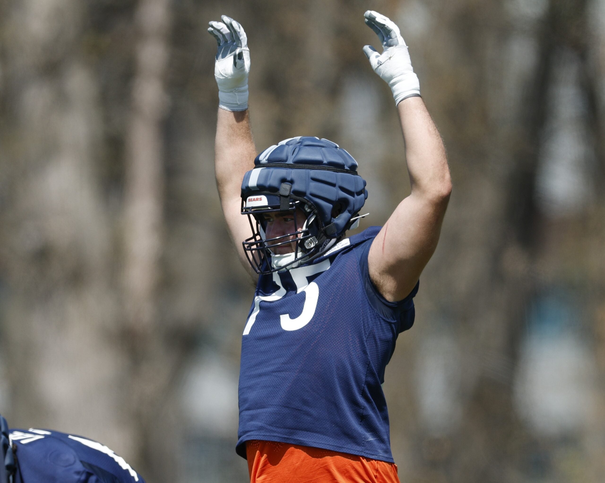 May 9, 2025; Lake Forest, IL, USA; Chicago Bears offensive line Ozzy Trapilo (75) warms up during the Rookie Minicamp at Halas Hall.