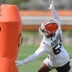 Jun 10, 2025; Berea, OH, USA; Cleveland Browns defensive end Ogbo Okoronkwo (54) runs a drill during minicamp at CrossCountry Mortgage Campus.