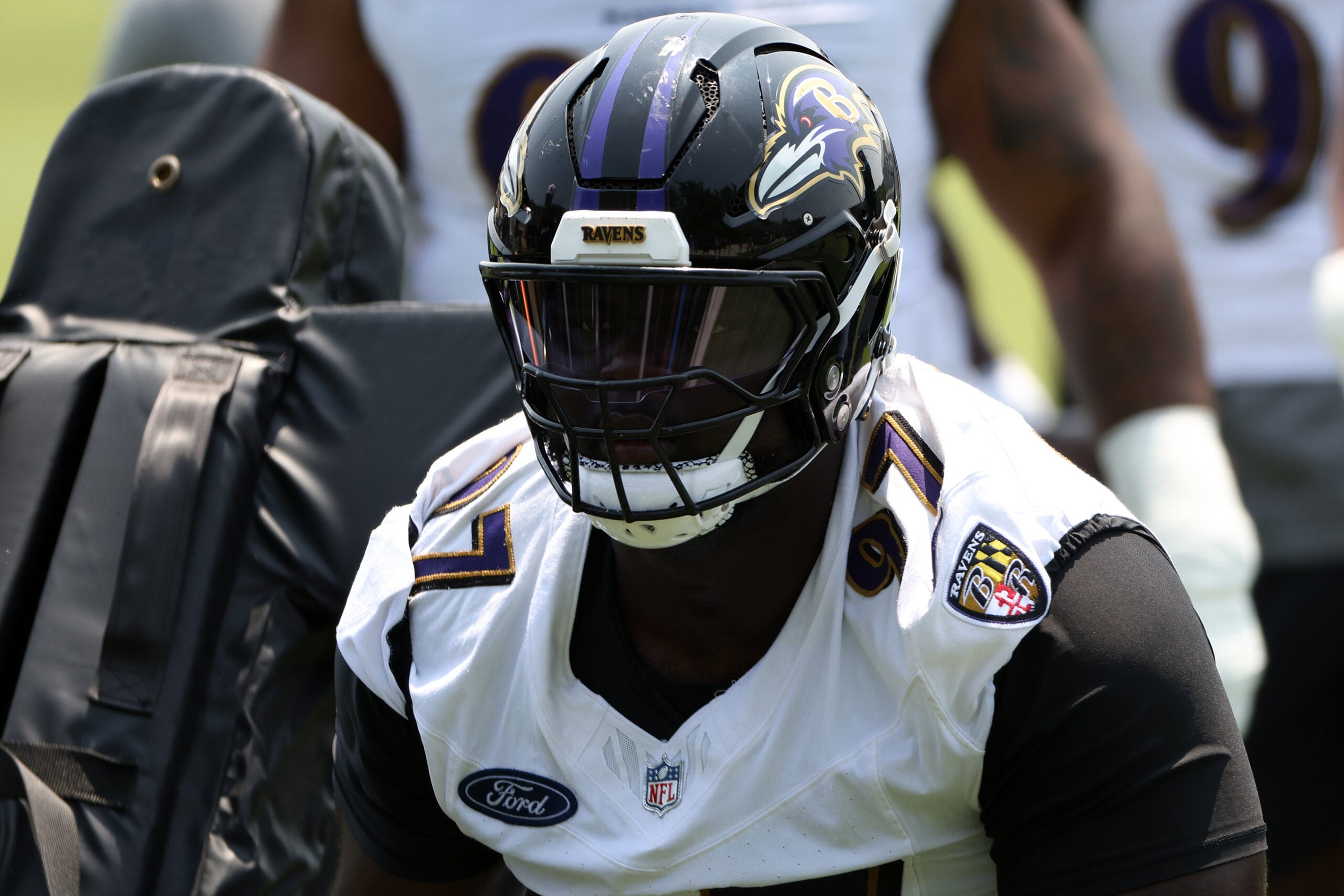 Jun 11, 2025; Baltimore, MD, USA; Baltimore Ravens defensive tackle C.J. Okoye (97) looks on during an NFL OTA at Under Armour Performance Center.