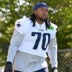 Jul 23, 2025; Foxborough, MA, USA; New England Patriots offensive tackle Caedan Wallace (70) walks to the practice field for training camp at Gillette Stadium.