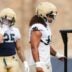 Notre Dame defensive lineman Junior Tuihalamaka, right, lines up for a drill during a football practice at Irish Athletic Center on Thursday, July 31, 2025, in South Bend.