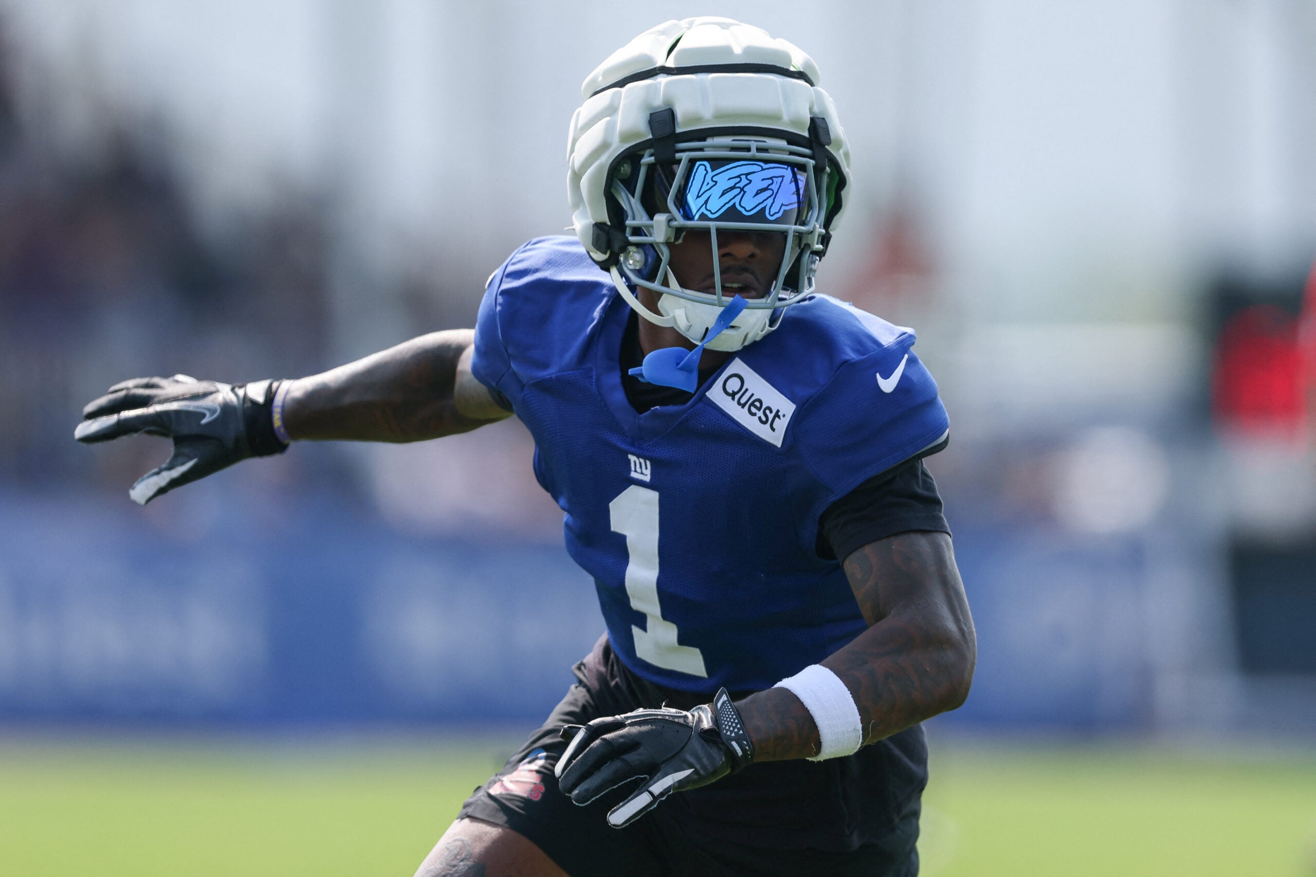 Aug 4, 2025; East Rutherford, NJ, USA; New York Giants wide receiver Malik Nabers (1) runs a route during training camp at Quest Diagnostics Training Center.