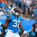 Aug 8, 2025; Charlotte, North Carolina, USA; Carolina Panthers linebacker Trevin Wallace (32) reacts in the first quarter at Bank of America Stadium.
