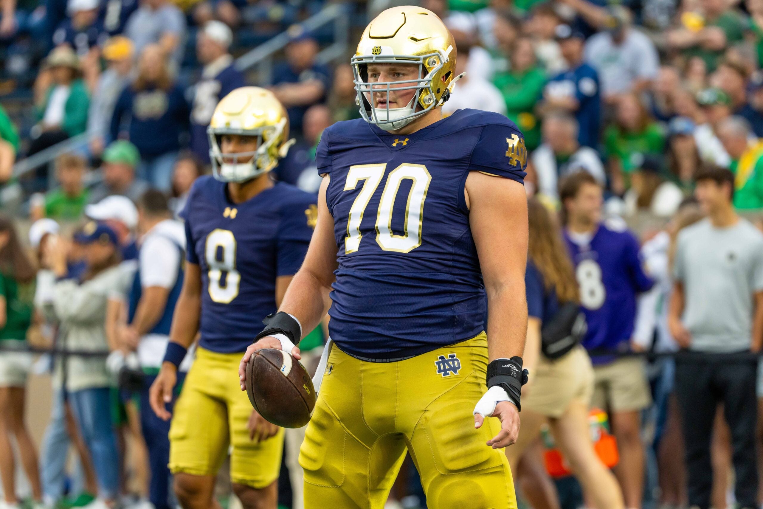 Sep 13, 2025; South Bend, Indiana, USA; Notre Dame Fighting Irish offensive lineman Ashton Craig (70) during warmups before a game against the Texas A&M Aggies at Notre Dame Stadium.