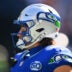 Oct 5, 2025; Seattle, Washington, USA; Seattle wide receiver Jake Bobo (19) wearing the Seahawks throw back helmet prior to a game against the Tampa Bay Buccaneers at Lumen Field.