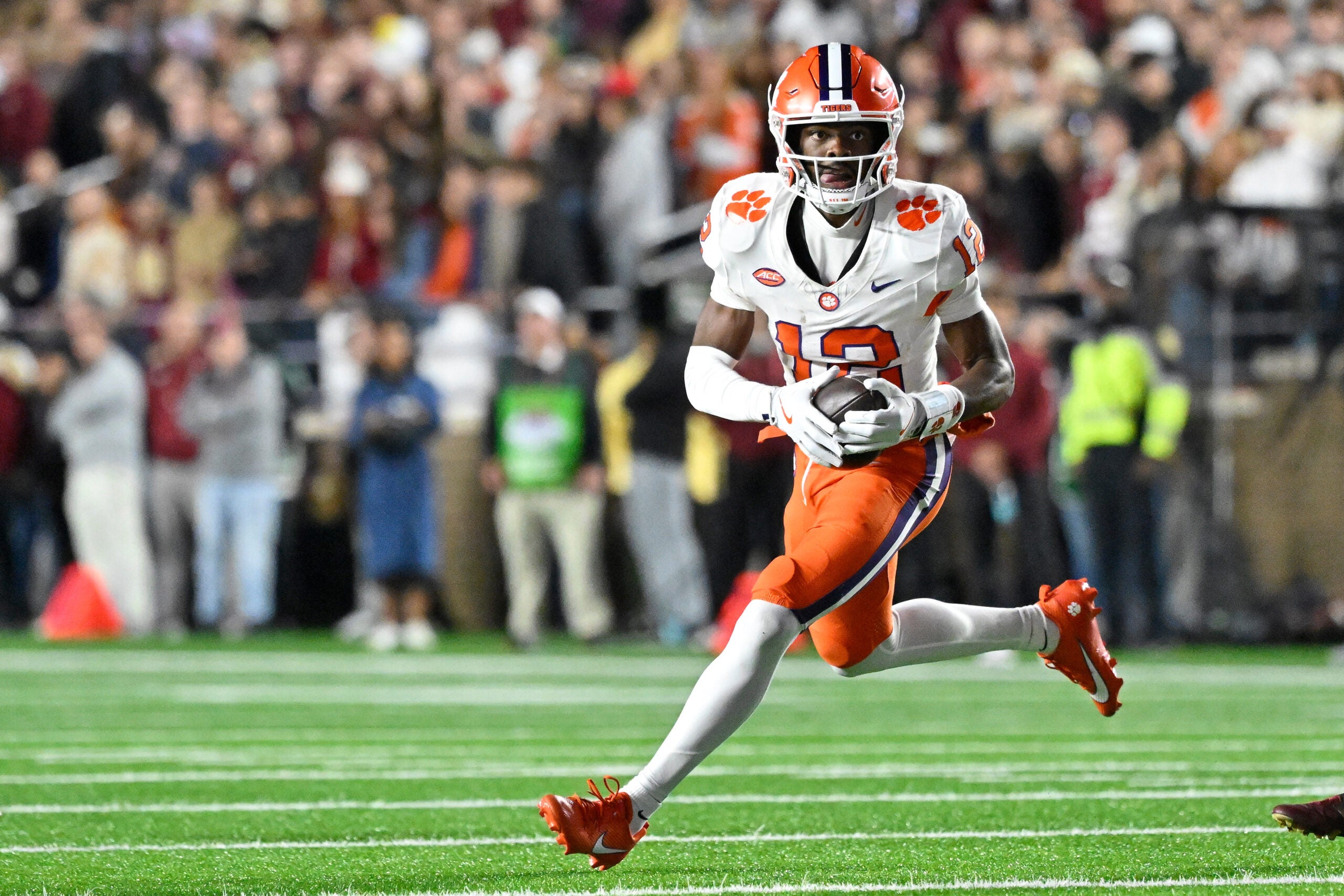 Oct 11, 2025; Chestnut Hill, Massachusetts, USA; Clemson Tigers wide receiver Bryant Wesco Jr. (12) runs with the ball during the first half against the Boston College Eagles at Alumni Stadium.