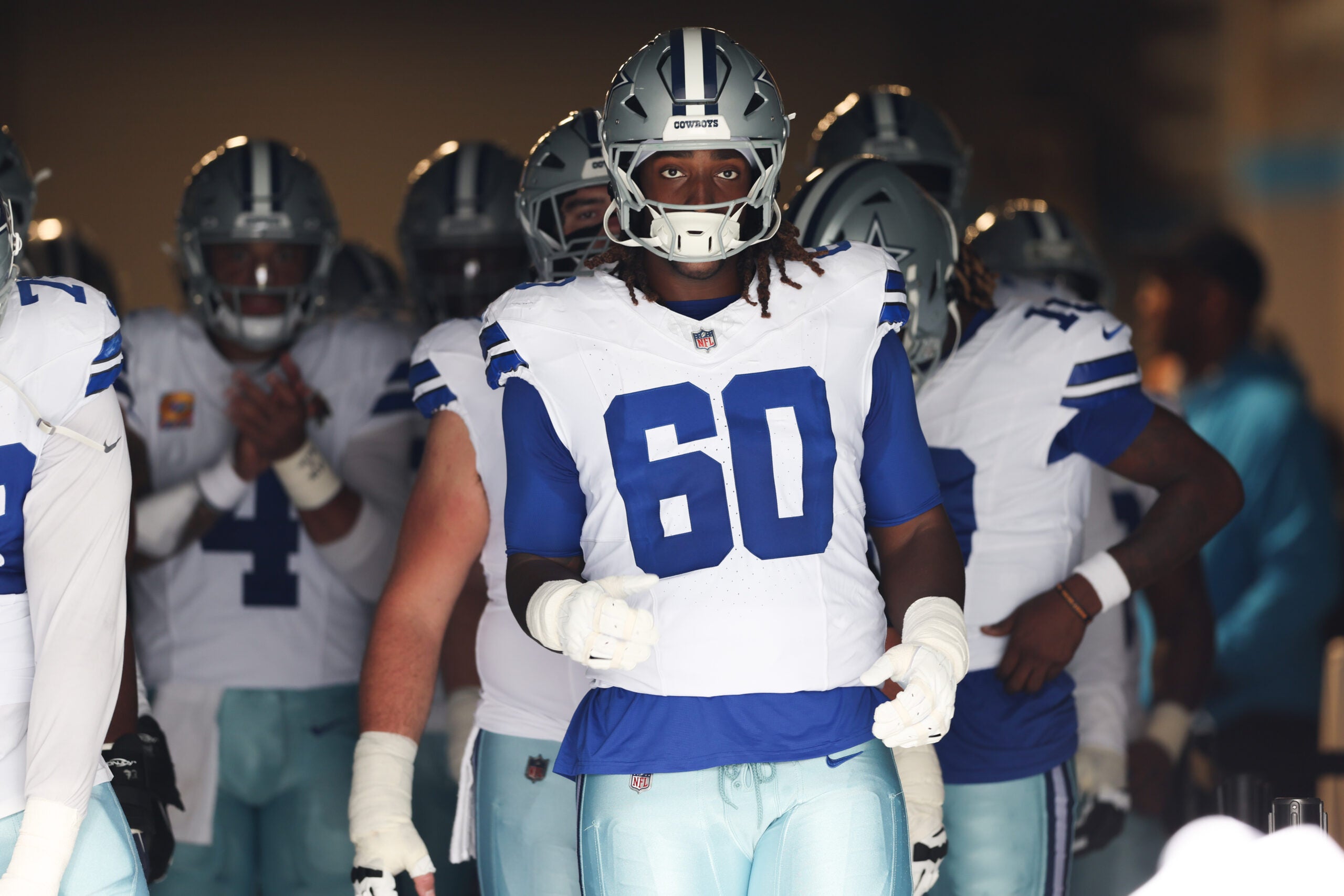 Oct 12, 2025; Charlotte, North Carolina, USA; Dallas Cowboys offensive tackle Tyler Guyton (60) prepares to enter the field prior to the game against the Carolina Panthers at Bank of America Stadium.