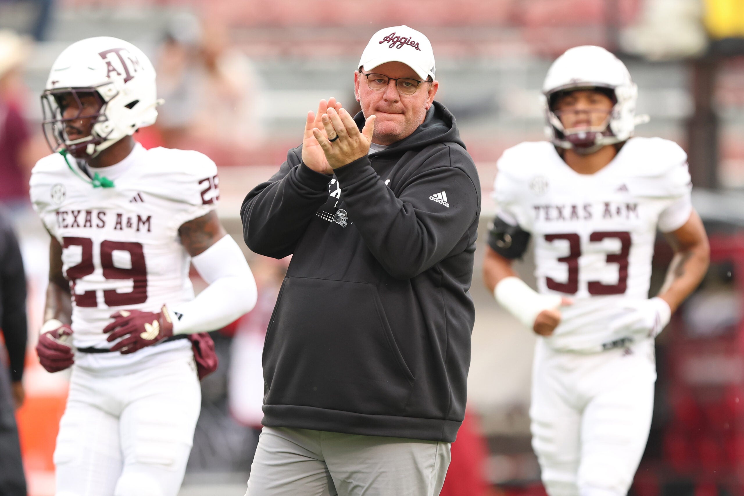Oct 18, 2025; Fayetteville, Arkansas, USA; Texas A&M Aggies head coach Mike Elko prior to the game against the Arkansas Razorbacks at Donald W. Reynolds Razorback Stadium.