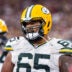 Oct 19, 2025; Glendale, Arizona, USA; Green Bay Packers guard Aaron Banks (65) against the Arizona Cardinals at State Farm Stadium.