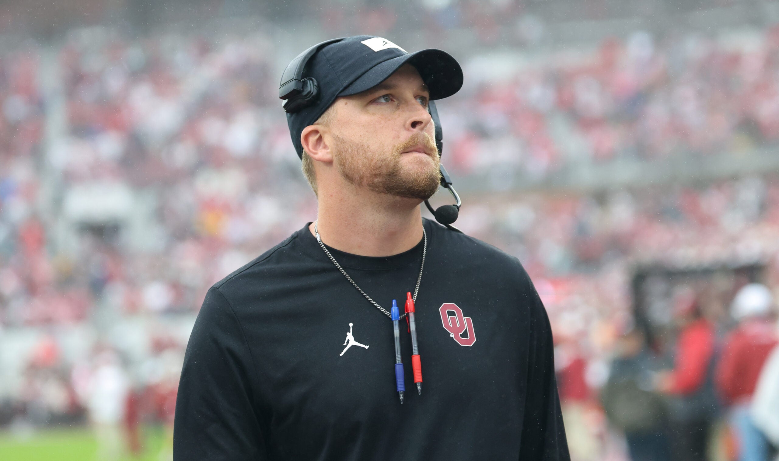 Oklahoma Sooners offensive coordinator Ben Arbuckle wide receiver Trell Harris