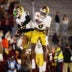 Nov 1, 2025; Chestnut Hill, Massachusetts, USA; Notre Dame safeties Tae Johnson (9) and Adon Shuler (8) leap and celebrate an interception in the fourth quarter against the Boston College Eagles at Alumni Stadium.