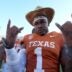 Texas Longhorns defensive end Colin Simmons (1) celebrates with the golden hat following the Red River Rivalry college football game between the University of Oklahoma Sooners and the Texas Longhorn at the Cotton Bowl Stadium in Dallas, Texas, Saturday, Oct. 11, 2025.
