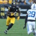 Nov 2, 2025; Pittsburgh, Pennsylvania, USA; Pittsburgh Steelers running back Kaleb Johnson (20) runs the ball against Indianapolis Colts cornerback Mekhi Blackmon (29) during the third quarter at Acrisure Stadium.